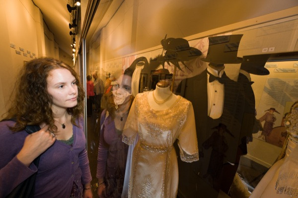 Woman looking at the costume gallery